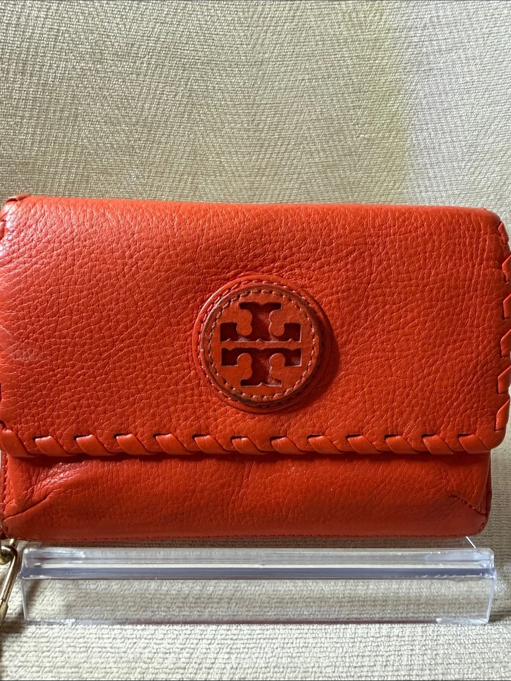 Tory Burch Orange Leather Wristlet with Logo Medallion